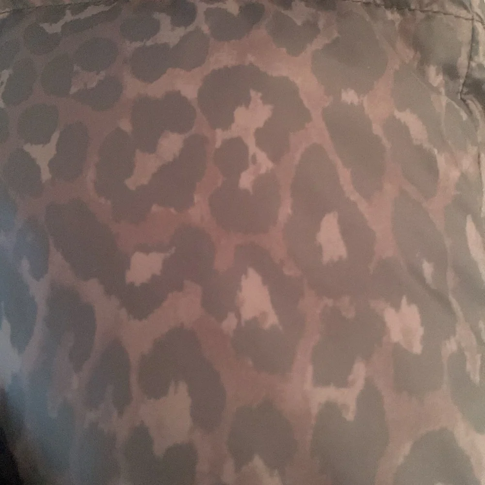 EUC Coach Animal Print 70 % Duck Down Puffer Vest  Medium ( can fit large )